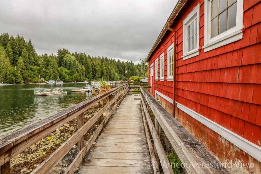 Red house along the boardwalk in Bamfield Vancouver Island, BC. Vancouver Island View